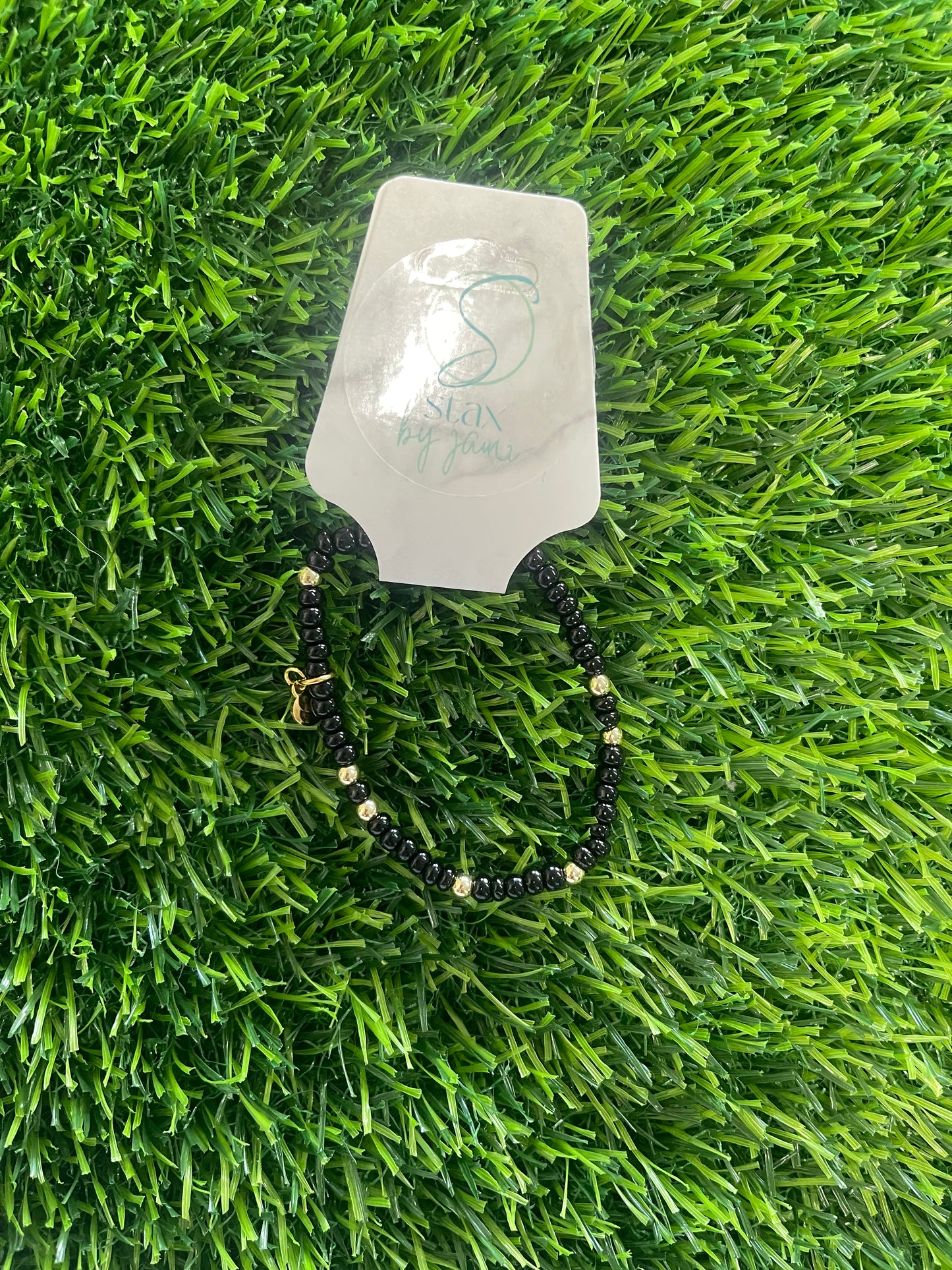 small black/gold bracelet