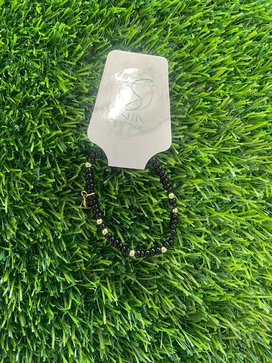 small black/gold bracelet