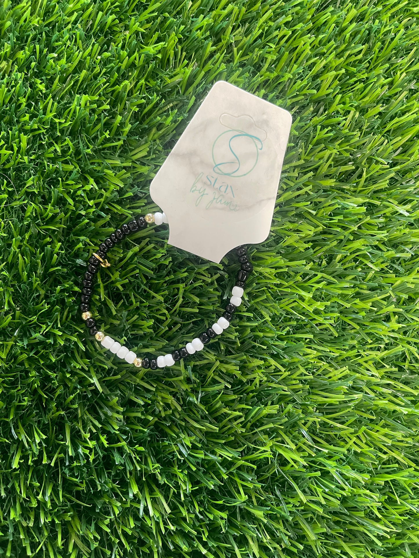 small black/gold/white braclete